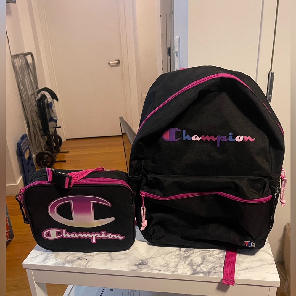Black and hot pink champion backpack with lunch-bag